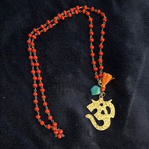 Gold tone Om symbol wooden Beaded Necklace